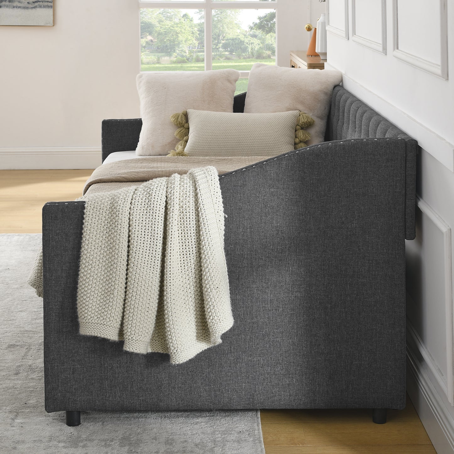 upholstered tufted sofa bed with drawers in grey